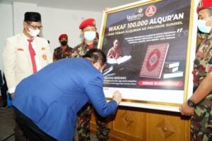 Buka Rakerwil, Pemuda Muhammadiyah Sumsel Luncurkan Wakaf 100.000 Al-Qur’an