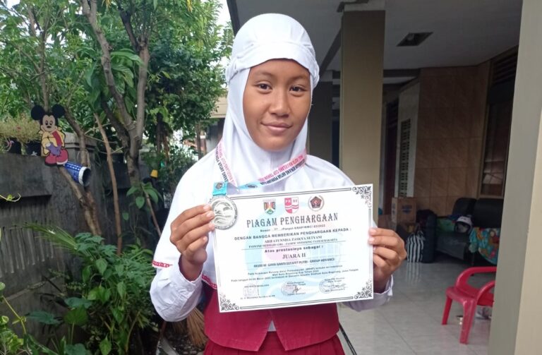 Siswa SD Muhammadiyah Raih Medali Renang Nasional image